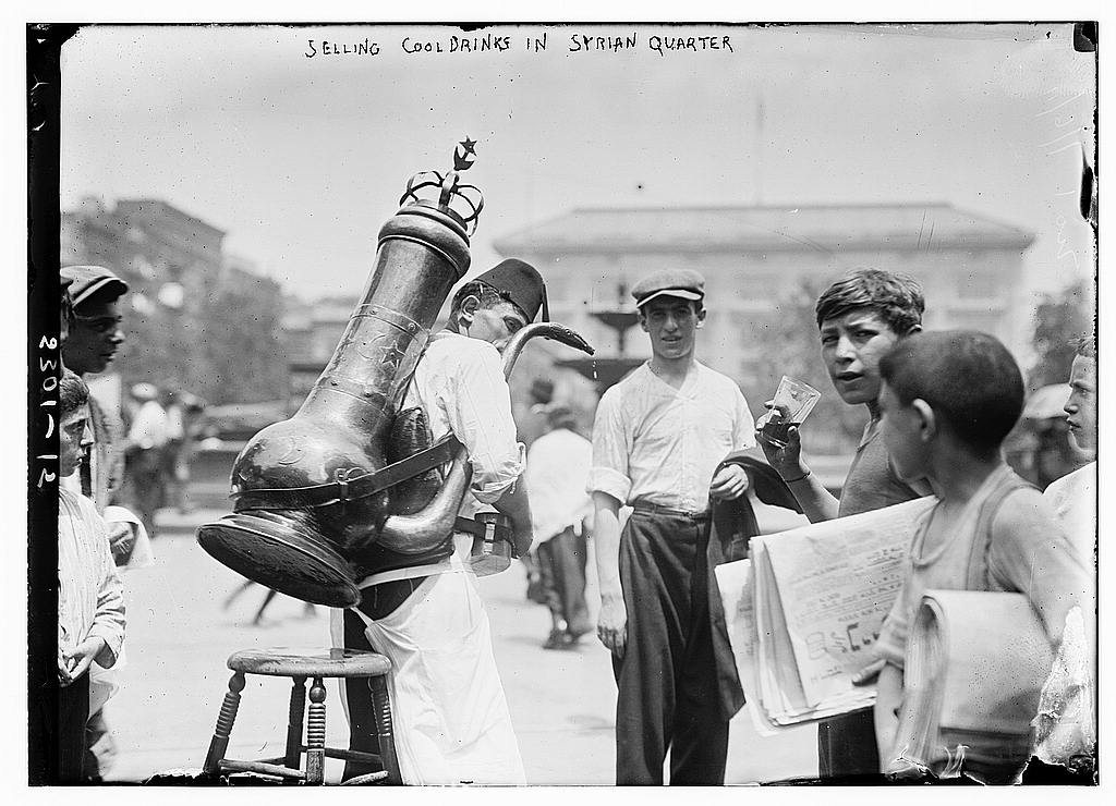 A street vendor selling cool drinks in Little Syria, Manhattan, around 1910–1916