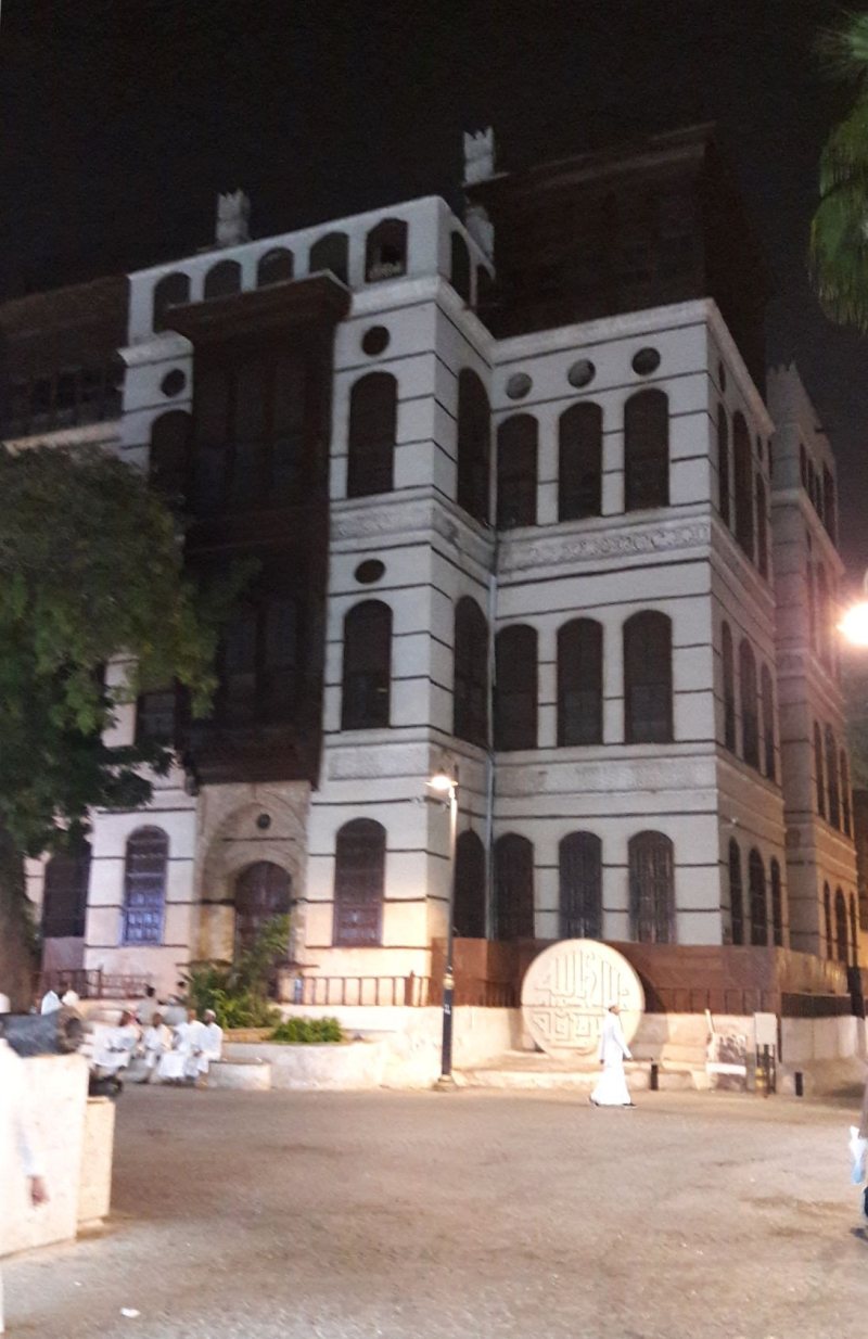 Bayt Nasseef at night, lit above its square in Al-Balad